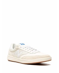 Мужские бежевые кожаные низкие кеды от New Balance