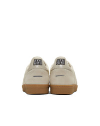 Мужские бежевые кожаные низкие кеды от AMI Alexandre Mattiussi