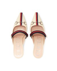 Бежевые кожаные сабо от Gucci