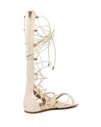 Бежевые кожаные сандалии на плоской подошве от Aldo