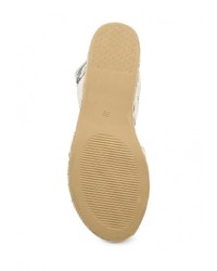 Бежевые кожаные сандалии на плоской подошве от Caprice