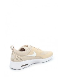 Женские бежевые кроссовки от Nike