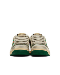 Мужские бежевые низкие кеды с принтом от Gucci