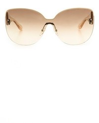 Женские бежевые солнцезащитные очки от Marc by Marc Jacobs