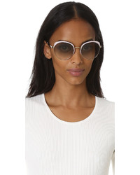 Женские бежевые солнцезащитные очки от Prada