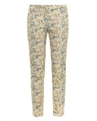 Бежевые узкие брюки с цветочным принтом