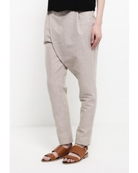 Бежевые узкие брюки от D.VA