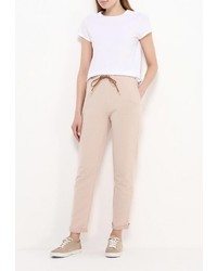 Бежевые узкие брюки от Modis