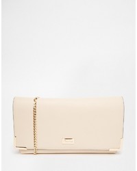 Бежевый клатч от Dune