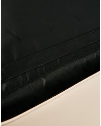 Бежевый клатч от Dune