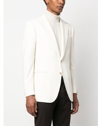 Мужской бежевый пиджак от Caruso