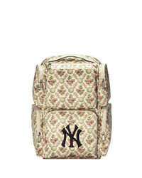 Женский бежевый рюкзак из плотной ткани с цветочным принтом от Gucci