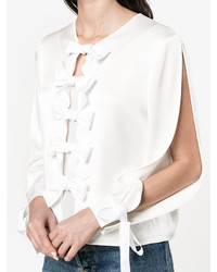 Белая блузка с украшением от Fendi