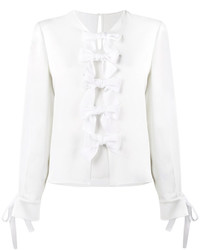 Белая блузка с украшением от Fendi