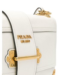 Белая кожаная сумка через плечо от Prada