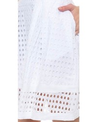 Белая короткая юбка-солнце с люверсами
