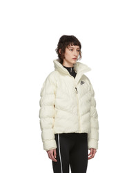 Женская белая куртка-пуховик от Nike