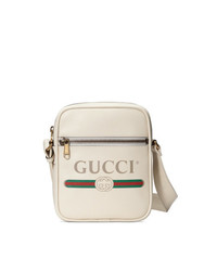 Белая сумка почтальона с принтом от Gucci