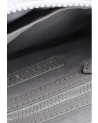 Белая сумка через плечо от Lacoste