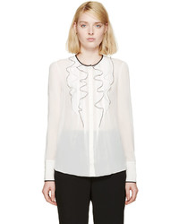 Белая шелковая блузка с рюшами от Nina Ricci