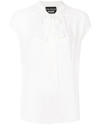 Белая шелковая блузка от Moschino