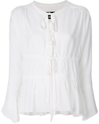 Белая шелковая блузка от Moschino