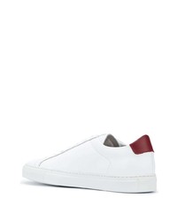 Мужские бело-красные кожаные низкие кеды от Common Projects