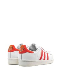 Мужские бело-красные кожаные низкие кеды от adidas