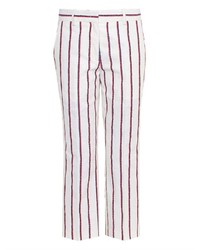 Бело-красные узкие брюки в вертикальную полоску