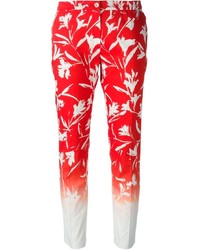 Бело-красные узкие брюки с цветочным принтом от Blumarine