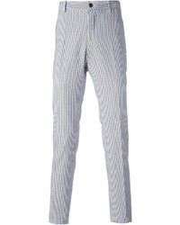 Бело-синие классические брюки в вертикальную полоску