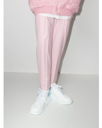 Мужские бело-синие кожаные низкие кеды от Alexander McQueen