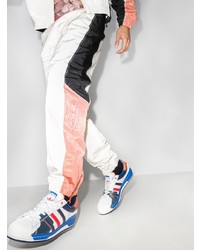 Мужские бело-темно-синие кожаные низкие кеды от adidas