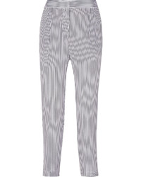 Бело-темно-синие узкие брюки в вертикальную полоску
