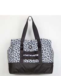 Бело-черная сумка из плотной ткани с леопардовым принтом