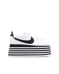 Бело-черные кожаные кроссовки на танкетке от Nike