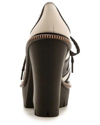 Бело-черные кожаные массивные ботильоны от Marc by Marc Jacobs