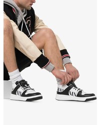 Мужские бело-черные кожаные низкие кеды с принтом от Balmain