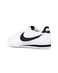 Женские бело-черные кожаные низкие кеды от Nike