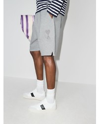 Мужские бело-черные кожаные низкие кеды от Axel Arigato