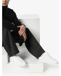 Мужские бело-черные кожаные низкие кеды от Golden Goose