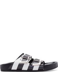 Бело-черные кожаные сандалии на плоской подошве от Givenchy