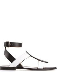 Бело-черные кожаные сандалии на плоской подошве от Givenchy