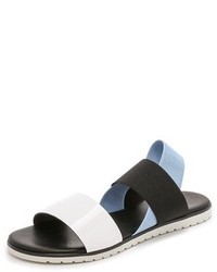 Бело-черные кожаные сандалии на плоской подошве от Studio Pollini