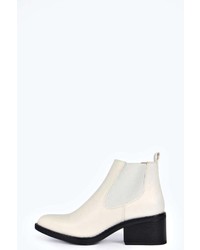 Бело-черные массивные ботильоны