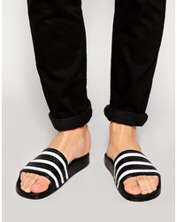 Бело-черные резиновые сандалии в горизонтальную полоску