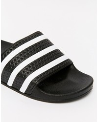 Мужские бело-черные резиновые сандалии в горизонтальную полоску от adidas