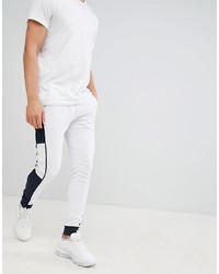 Мужские бело-черные спортивные штаны от ASOS DESIGN