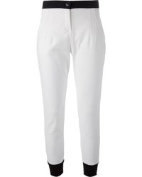 Бело-черные узкие брюки от Isola