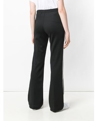 Бело-черные широкие брюки от Moncler